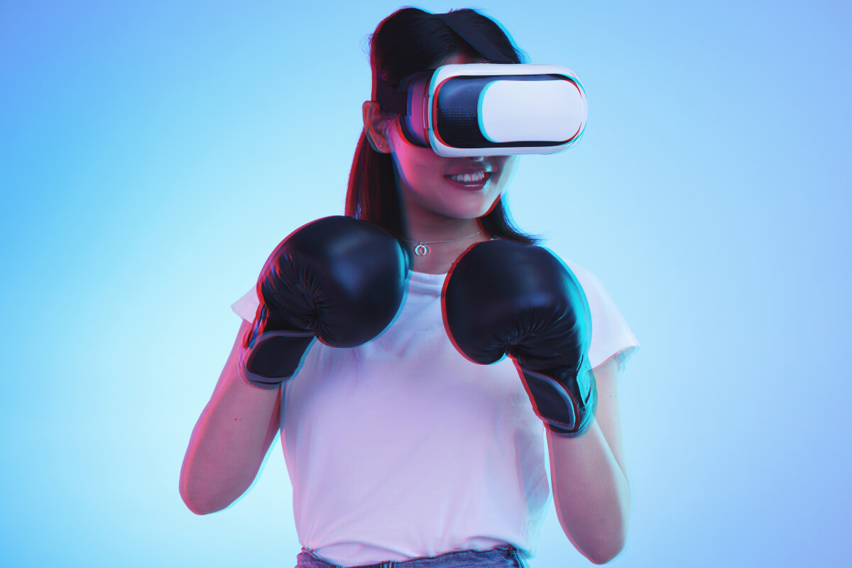 virtual-reality-metaverse-and-a-gamer-woman-boxin-P8FZ9NM.jpg